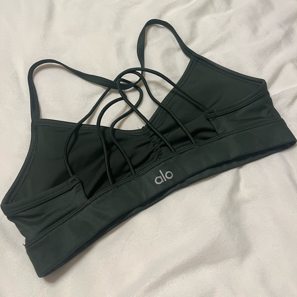 Dark green minimum support Alo Yoga sports bra